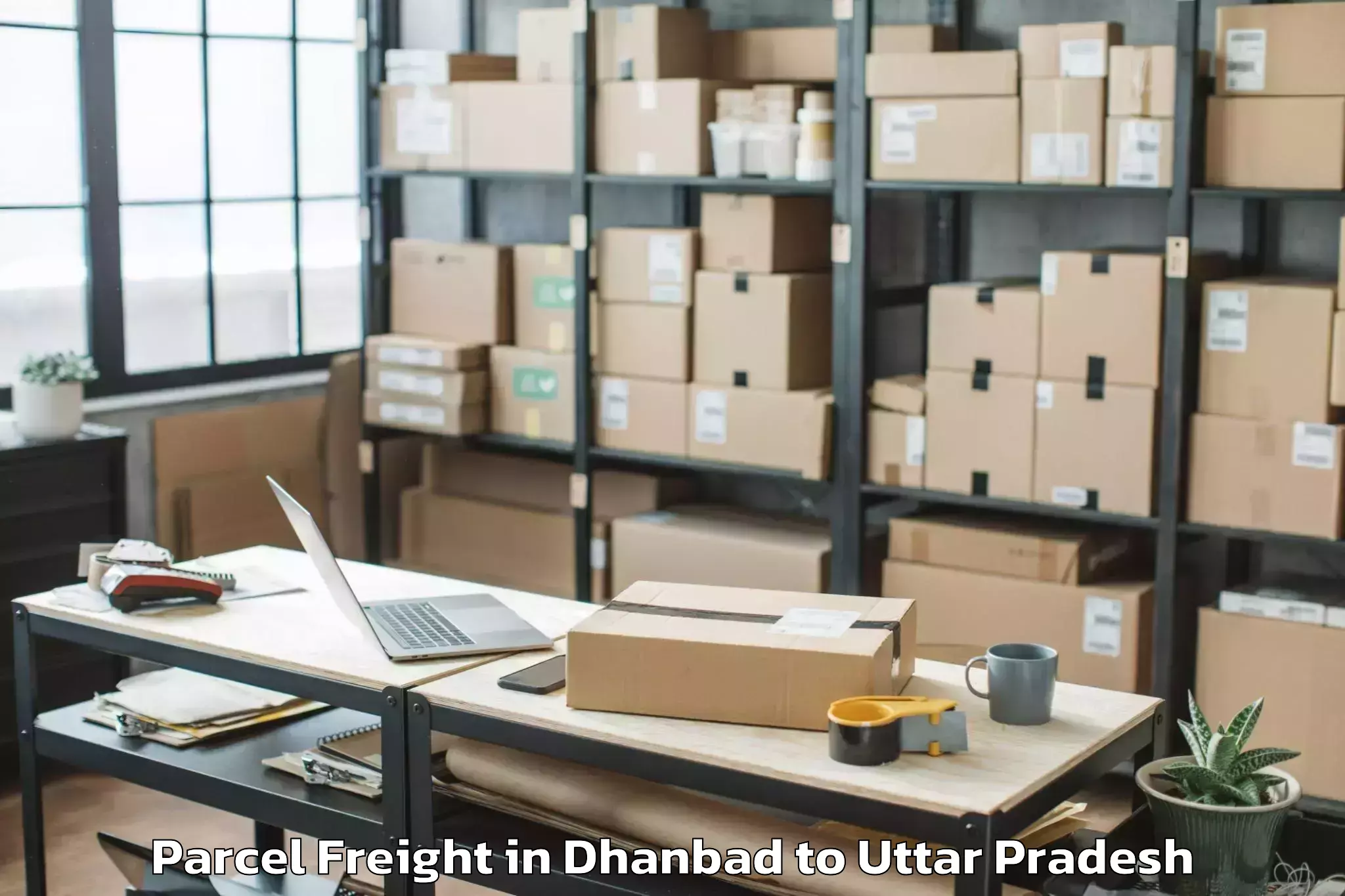 Book Your Dhanbad to Karwi Parcel Freight Today